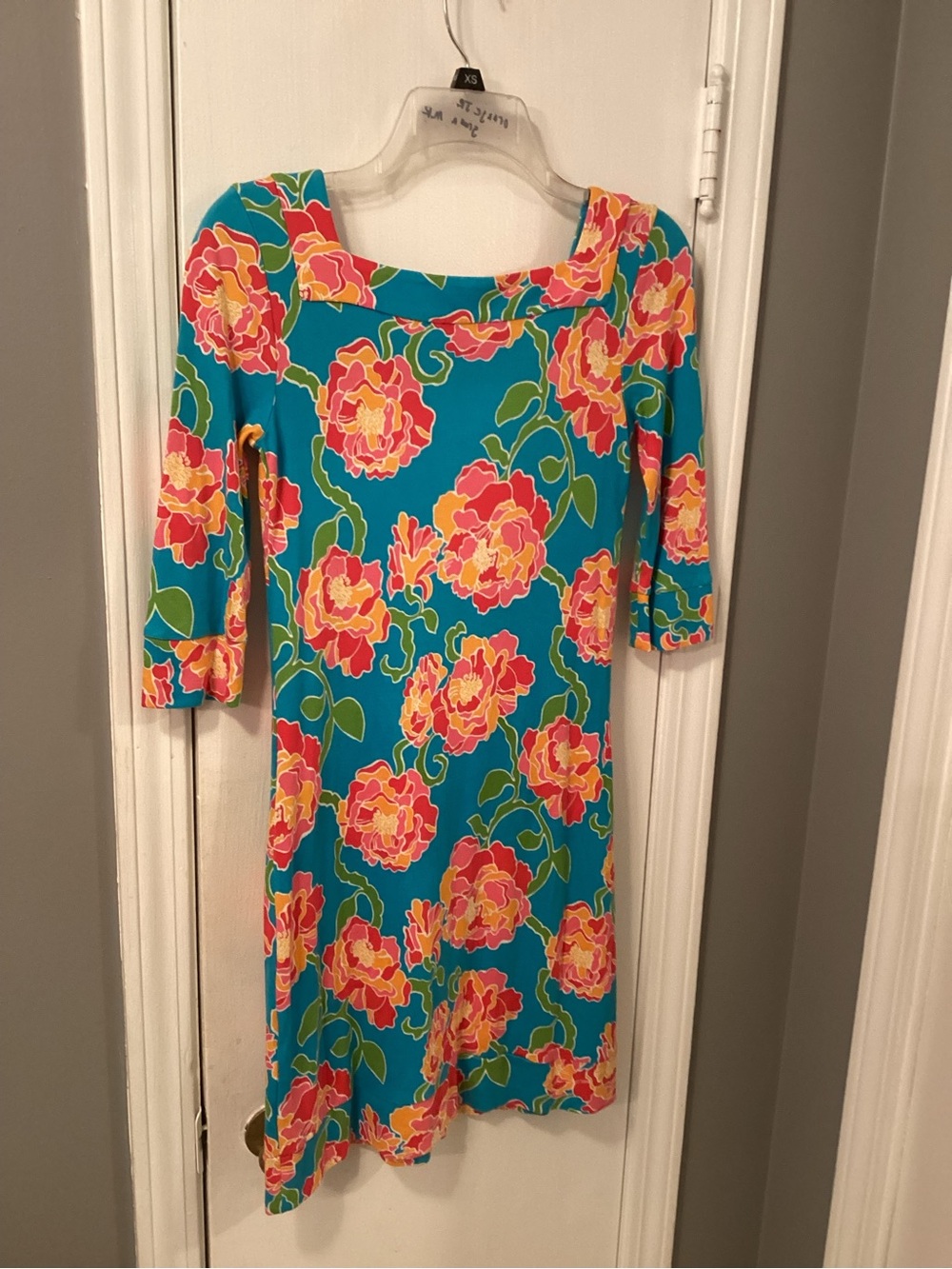 Lilly Pulitzer Teal Floral Long Sleeve Shift Dress with Pink and Yellow Blooms.
